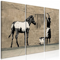 Canvas-taulu Artgeist Banksy: Washing Zebra on Concrete, 3-osainen, eri kokoja